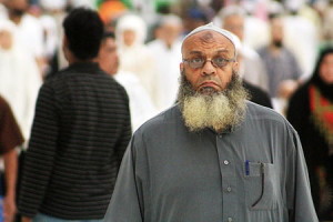 A man with a gnarly beard and zabib.